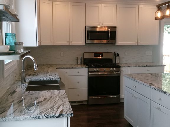 White cabinets, heron blue island