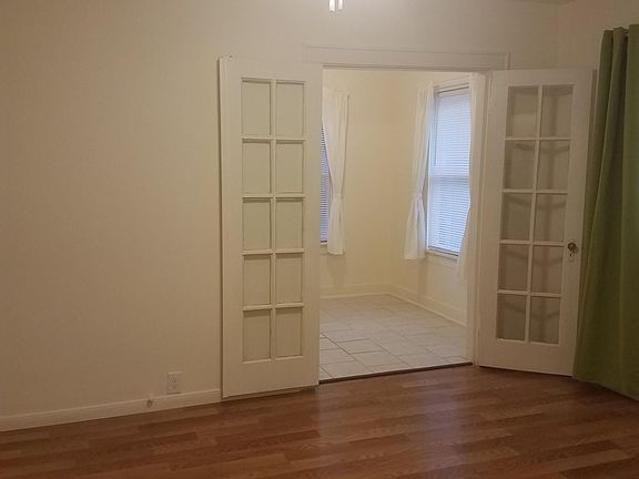 Living room looking into dining room.