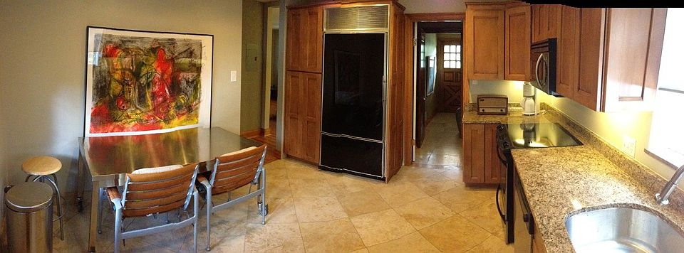 Kitchen with granite countertops and stainless steel applian
