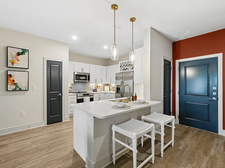 Kitchen with Quartz Countertop and Stainless Steel Appliances