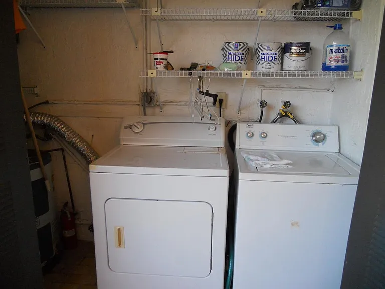 washer & drier in balcony closet