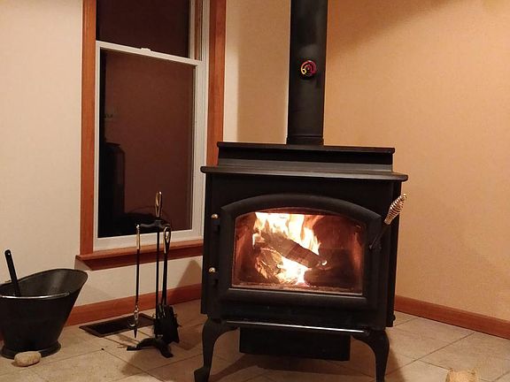 freestanding wood stove in great room