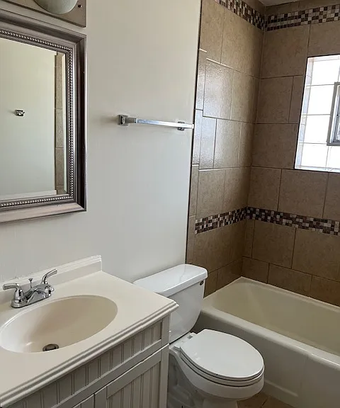 Updated, tiled bathroom
