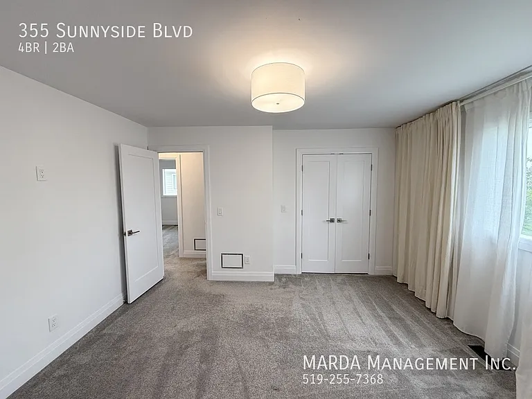 355 Sunnyside Blvd — Photo 36