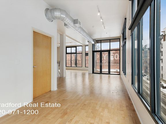 studio style loft door is to walk in closet and full bathroom
