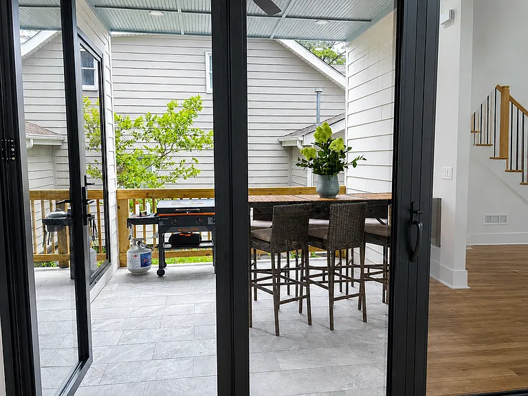Elegant dining space with seating for 8, steps away from your chef's kitchen and curated designer espresso bar! Designed for peaceful breakfasts, celebratory dinners, game nights, and meaningful moments together in a warm, elevated setting.