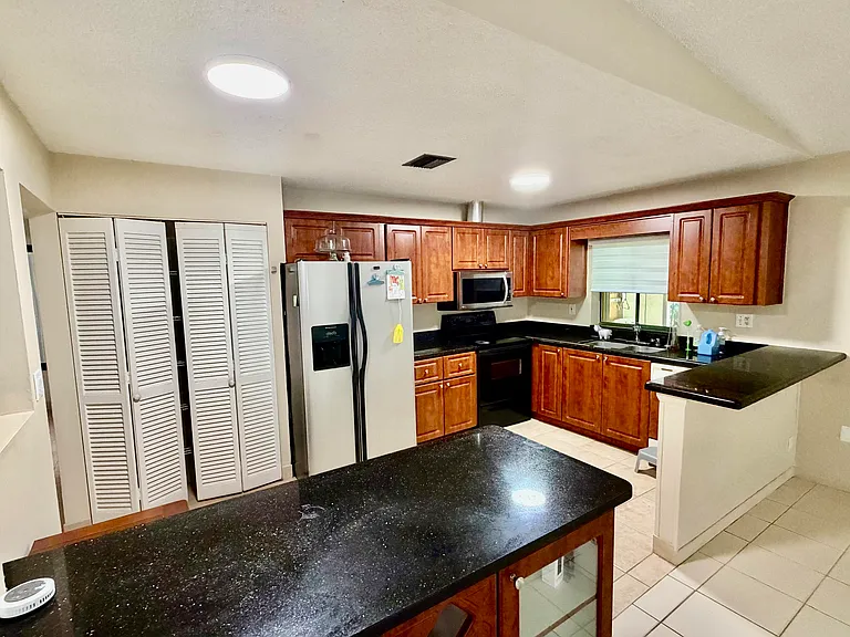7714 SW 8th Ct — Photo 1