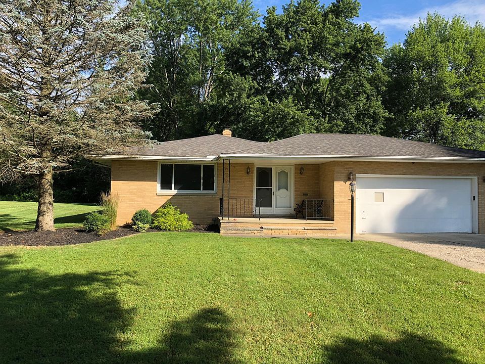 Brick ranch on quiet street with large backyard