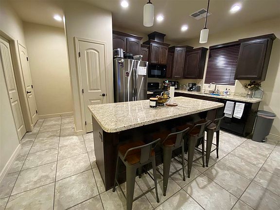 4th image of 10203 E 39th Way