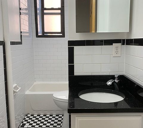 5th image of 165 W 4th St APT 13