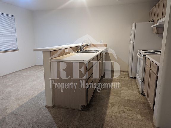 5th image of 12949 Granite Ln NW Unit 105