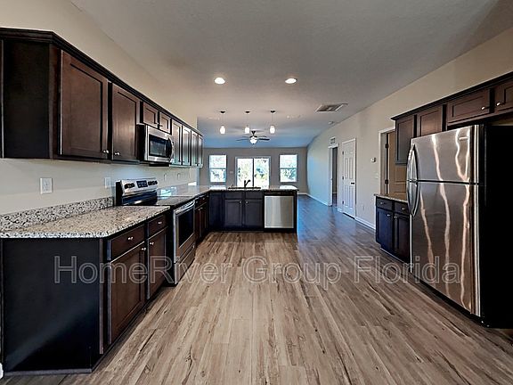 4th image of 8765 Kaye Ln