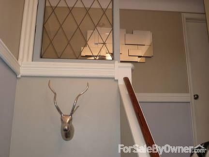 Entry foyer
						:
						Custom wrap-around crown moulding