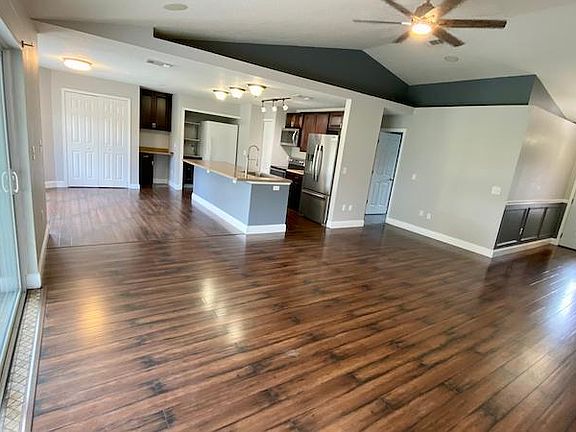 Large family/kitchen/dining combo view #1