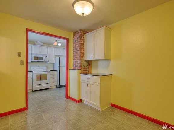Vinyl flooring and all kitchen appliances stay with home.