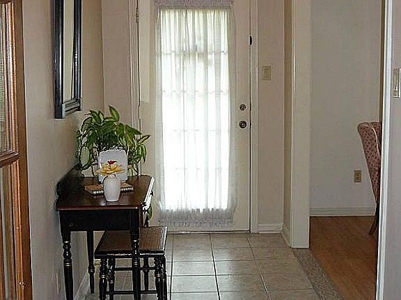 Entry with tile floor