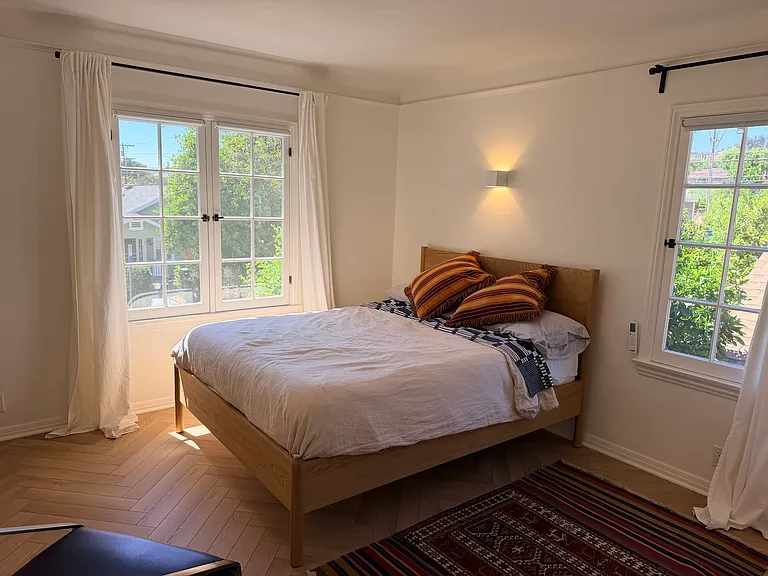 front bedroom - easily accommodates king or queen bed. shown here with queen.