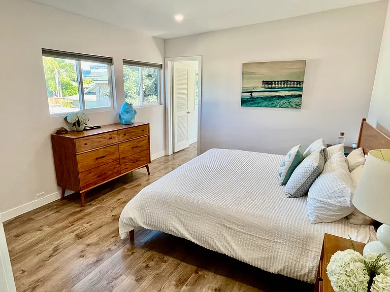 View of bedroom from entry door to bedroom. Door on far wall leads to 'office'.