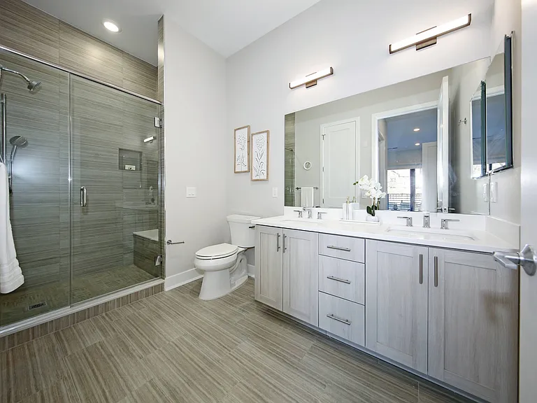 Shower with bench seat & double vanities