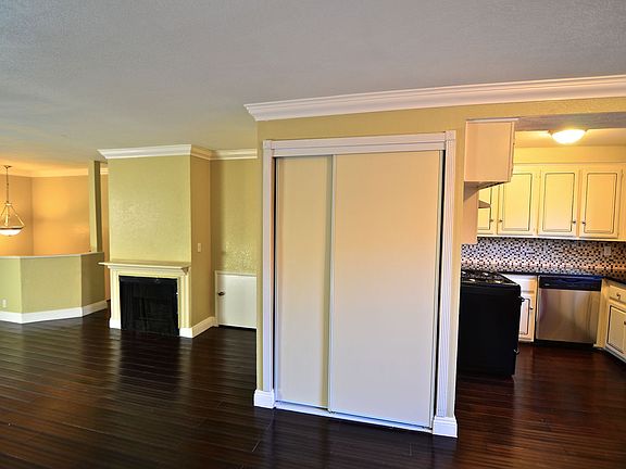 Living room and kitchen with additional storage