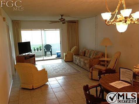 Dining room on right and the living room with the view out the back