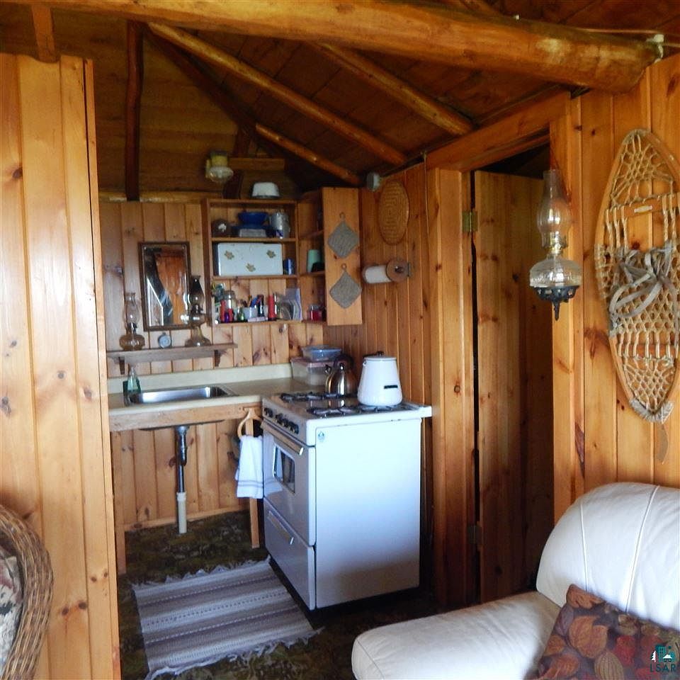 c. 1940 Waterfront Log Cabin For Sale on 7.3 Acres in Silver Bay, MN