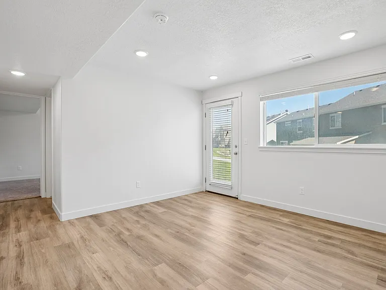 Downstairs bonus room: bedroom, office or living room.