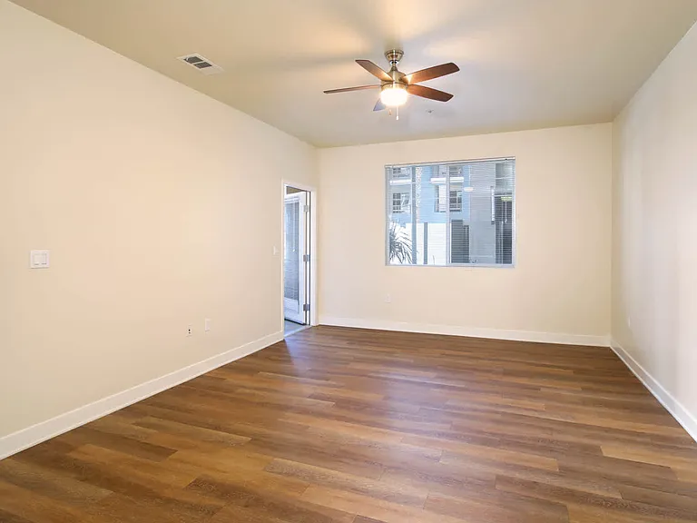 Living Room with Balcony and Hard Surface Flooring