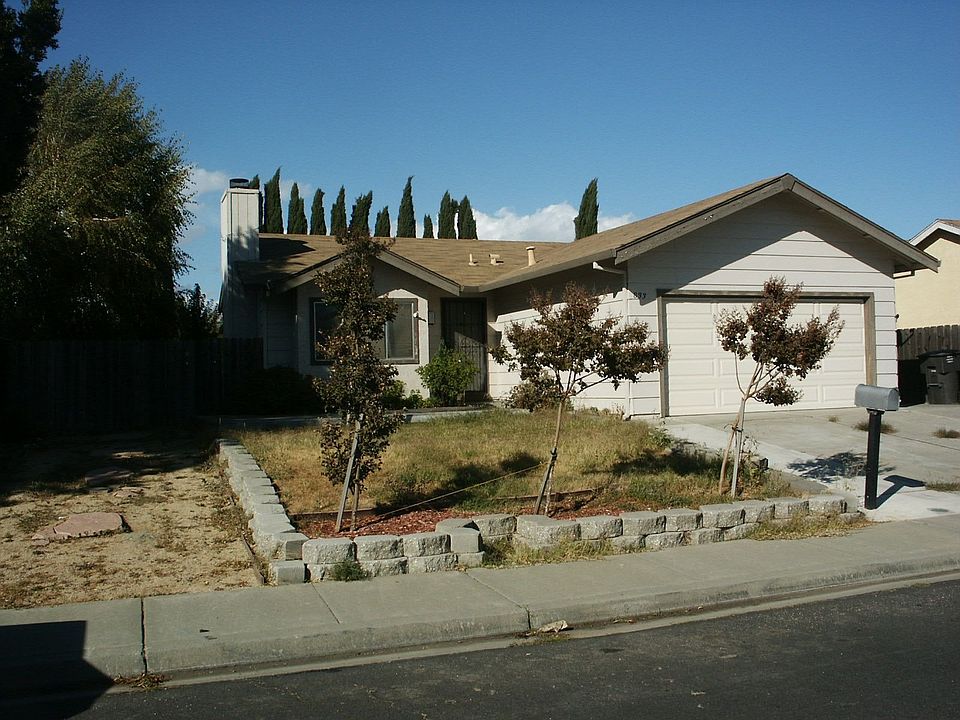 Front with  deck and  RV parking
