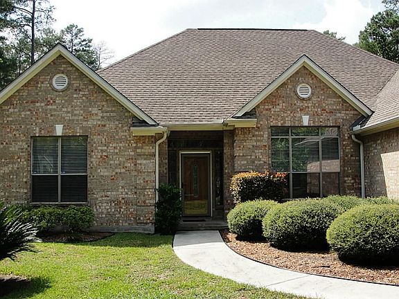 2 car attached and 2 car detached garages.