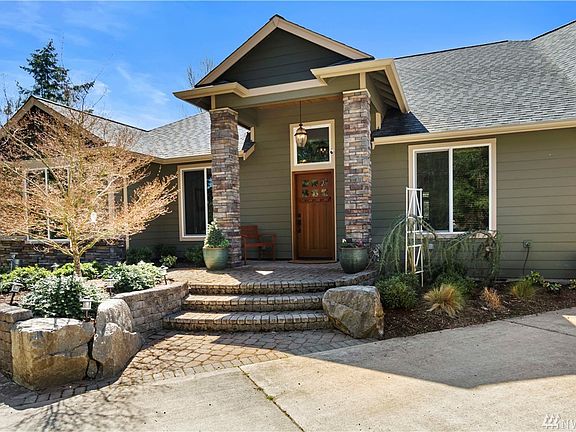Unique stone entry includes accessible ramp (just outside photo to the left)