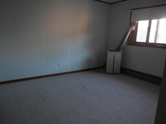 Another view of bedroom w/portable room A/C