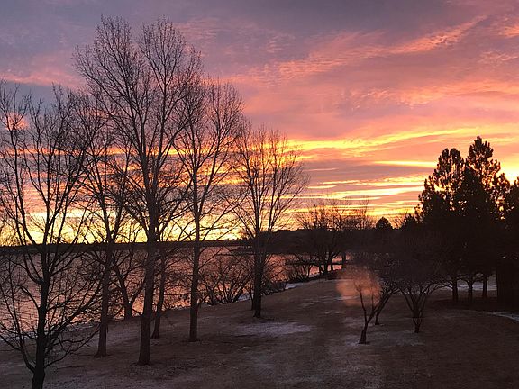 Wake up to these sunrises over the lake