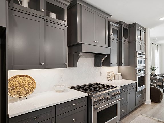 White hex backsplash in kitchen