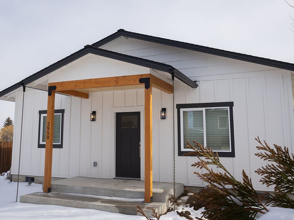 Front of house, covered porch shown