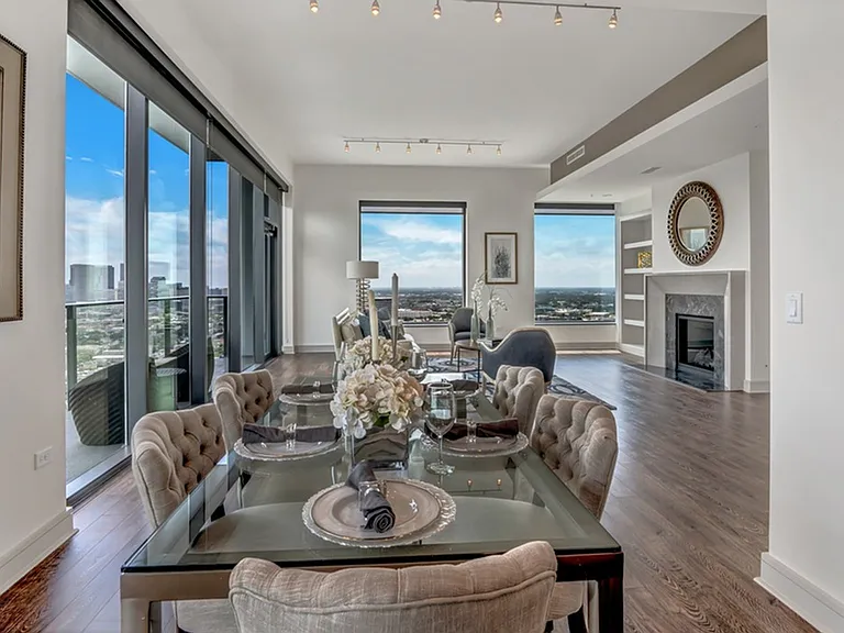 Features like the gas fireplace and wrap around windows make the Penthouse Homes complete