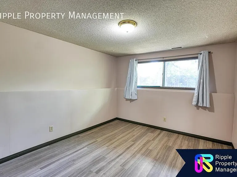 7712 Bowness Rd NW #E — Photo 10