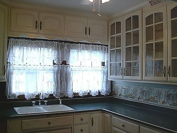 New kitchen with white cabinetry.