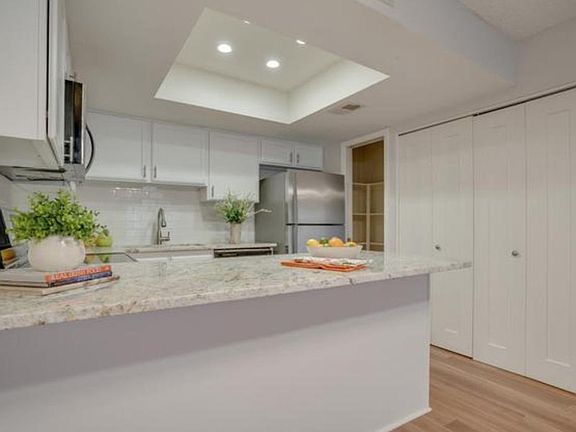 Front View of the Remodeled Kitchen, with space to sit at the counter.