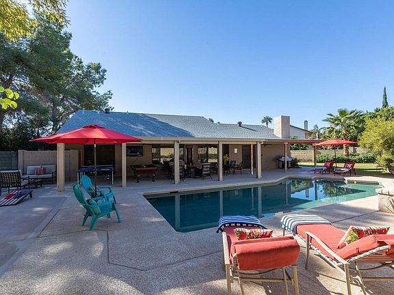 6 lounge chairs around the pool and plenty of other seating on the patio and the court!