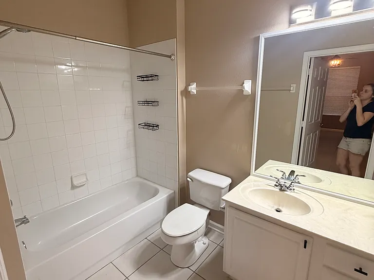 Master en-suite bathroom with new LED light fixtures to make getting ready a breeze