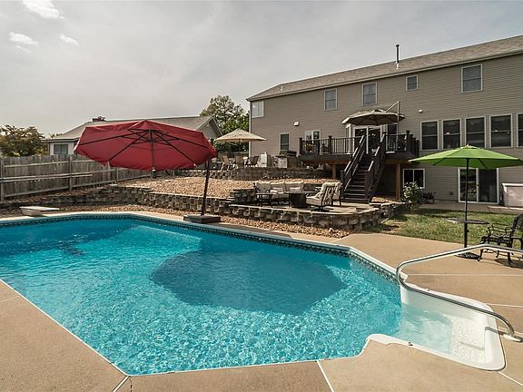 A view across the pool toward the rear of the house.