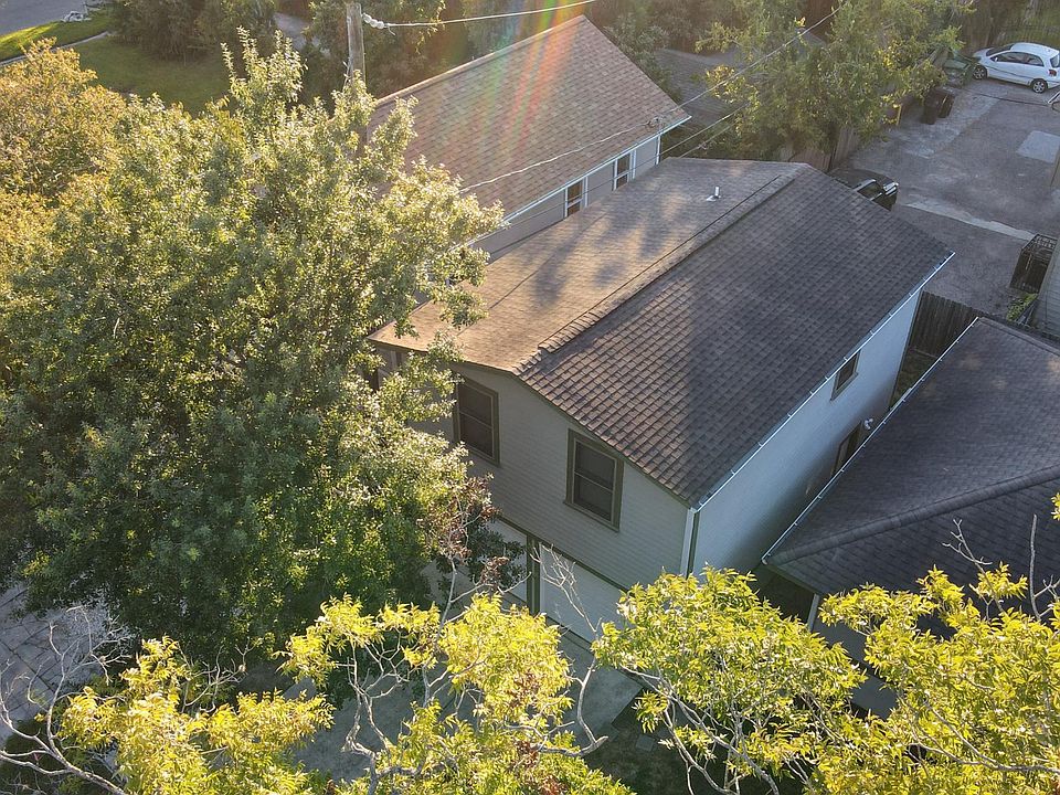 Enjoy lush tree-lined views from your second story apartment.