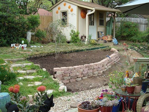 Landscape upgrade in back. Shed built in 2001