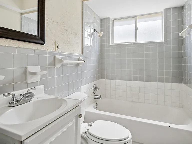 Cool bath with preserved vintage tile.