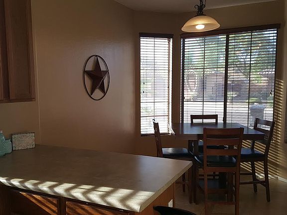 5th image of 15211 W Port Royale Ln