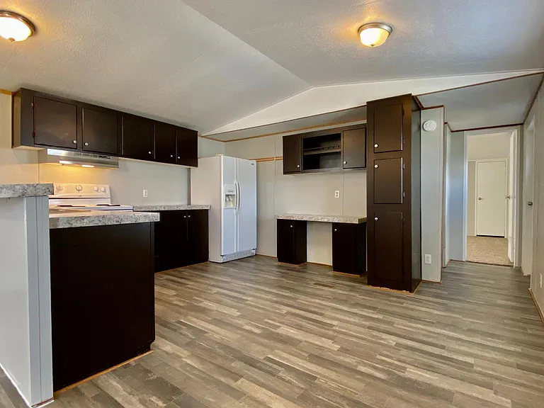 Kitchen and hallway to master bedroom