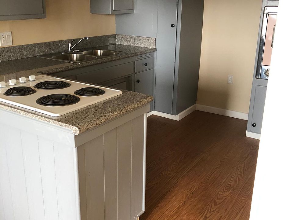 New granite countertops and laminate flooring.
