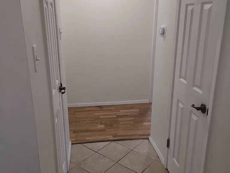 Side hallway looking at Entryway.