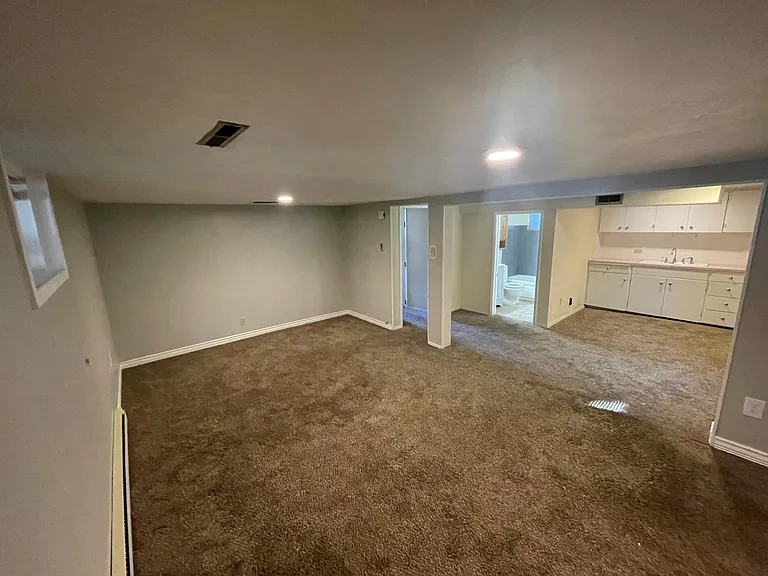 Lower level recreation room, kitchenette & restroom